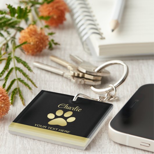 Gold Shiny Dog Paw auf schwarzem Hintergrund Schlüsselanhänger (Vorderseite rechts)