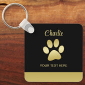 Gold Shiny Dog Paw auf schwarzem Hintergrund Schlüsselanhänger (Vorderseite)