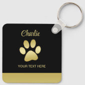Gold Shiny Dog Paw auf schwarzem Hintergrund Schlüsselanhänger (Rückseite)