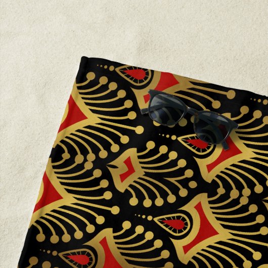 Gold und Rot Art Deco Muster auf schwarz Strandtuch (Beispiel)