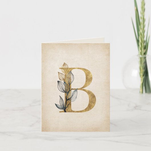 Gold- und Schwarz-B-Monogramm mit Blättern (Vorderseite)