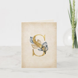 Gold- und Schwarz-S-Monogramm mit Blättern