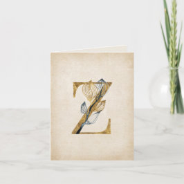 Gold- und Schwarz-Z-Monogramm mit Blättern
