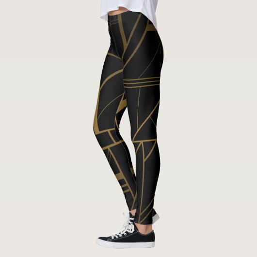 Gold und schwarze Leggings (Links)