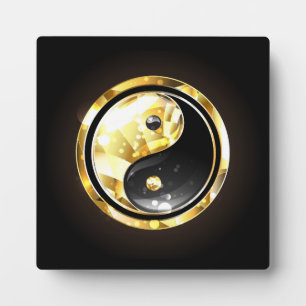 Gold Yin Yang auf schwarz Fotoplatte
