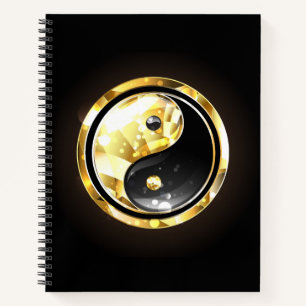 Gold Yin Yang auf schwarz Notizblock