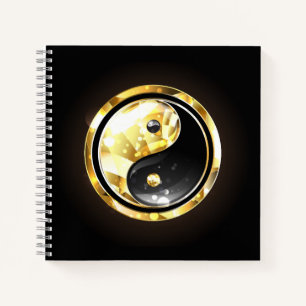 Gold Yin Yang auf schwarz Notizblock