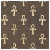 Goldägyptischer Ankh auf Dunkelbraun Stoff (Nahaufnahme)