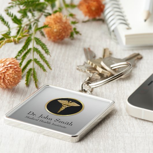 Goldberuflicher medizinischer Caduceus - Schlüsselanhänger (Seite)