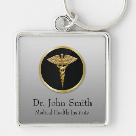 Goldberuflicher medizinischer Caduceus - Schlüsselanhänger