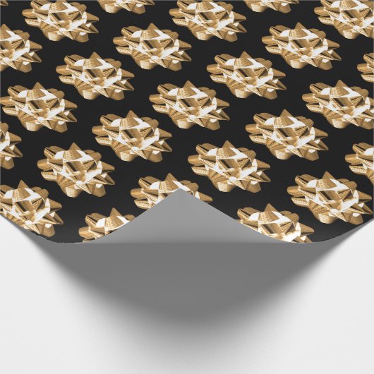 Goldbogen auf schwarzem Packpapier (Ecke)