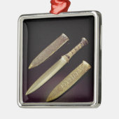 Golddolch und -hülle silbernes ornament (Links)