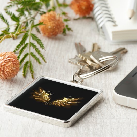 Golden Angel Wings auf schwarzem Hintergrund Schlüsselanhänger (Seite)