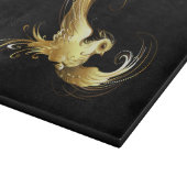 Golden Bird im schwarzen Hintergrund Schneidebrett (Ecke)