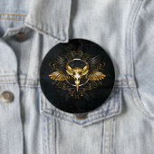 Golden Bird Skull auf schwarzem Hintergrund Button (Beispiel)