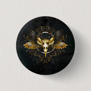 Golden Bird Skull auf schwarzem Hintergrund Button