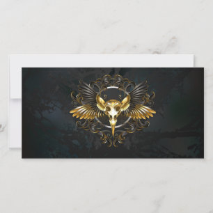 Golden Bird Skull auf schwarzem Hintergrund Feiertagskarte