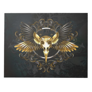 Golden Bird Skull auf schwarzem Hintergrund Notizblock