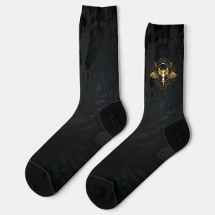 Golden Bird Skull auf schwarzem Hintergrund Socken