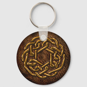 Golden celtic ornament on leather schlüsselanhänger