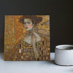 Golden Phase Gustav Klimt Mosaic Edwardian Woman C Fliese<br><div class="desc">This beautiful ceramic tile features an artwork inspired by Gustav Klimt's "golden phase, " depicting a woman from the Edwardian era. During this period, Klimt was fascinated with Byzantine mosaics and developed his mosaic technique using gold leaf and vibrant colors. This artwork pays tribute to Klimt's innovative mosaic approach and...</div>