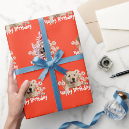 Golden Retriever auf Orange Geschenkpapier