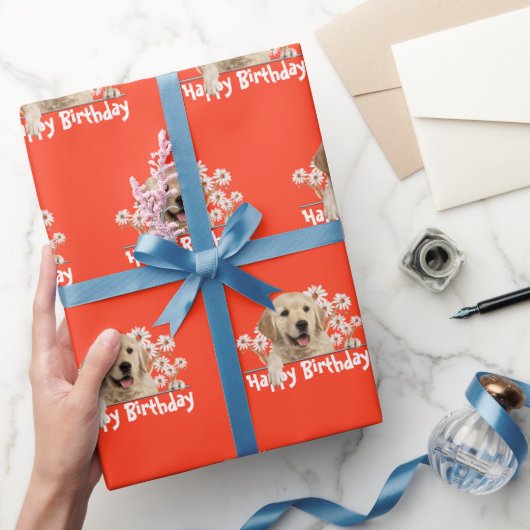 Golden Retriever auf Orange Geschenkpapier (Schenken)