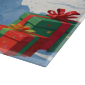 Golden Retriever im Schnee mit Weihnachtshut Schneidebrett (Ecke)