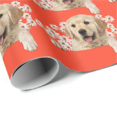Golden Retriever in den Gänsen auf Orange Geschenkpapier (Rolleneckpunkt)