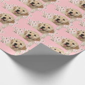 Golden Retriever in den Gänsen auf rosa Geschenkpapier (Ecke)