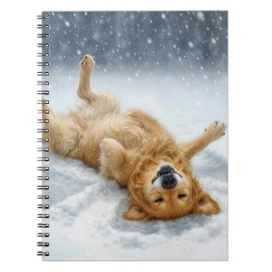 Golden Retriever macht einen Schneengel Notizblock