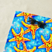 Golden Starfish auf Blue Strandtuch (Beispiel)