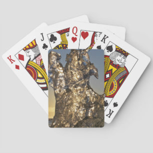 Golden sunrise seen through iceberg formation spielkarten