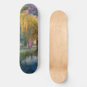 Golden Willow tree bei Sonnenuntergang am Teich Skateboard (Vorderseite)