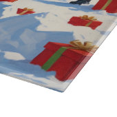 Goldendoodle läuft im Schnee mit Weihnachtshut Schneidebrett (Ecke)