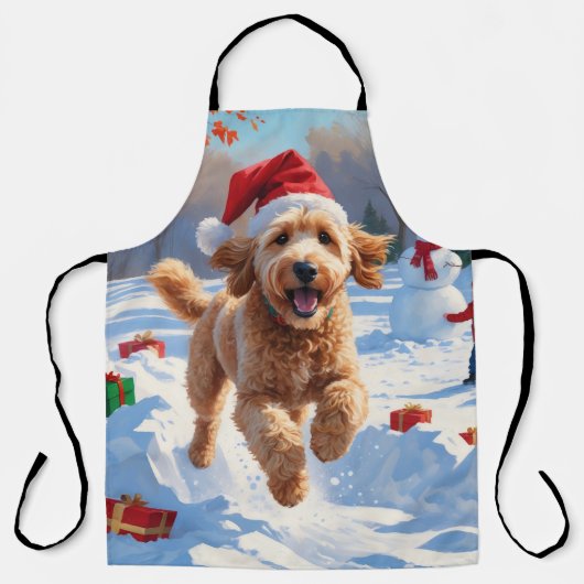 Goldendoodle läuft im Schnee mit Weihnachtshut Schürze (Vorderseite)
