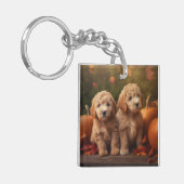 Goldendoodle Welpe Herbst Kürbis Schlüsselanhänger (Vorderseite links)
