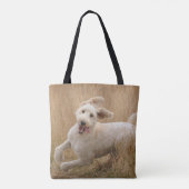 Goldendoodrom läuft durch Gras Tasche (Rückseite)