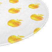 Goldene Äpfel auf Weiß Schneidebrett (Ecke)