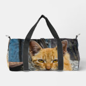 Goldene Augen Duffle Bag (Vorderseite)