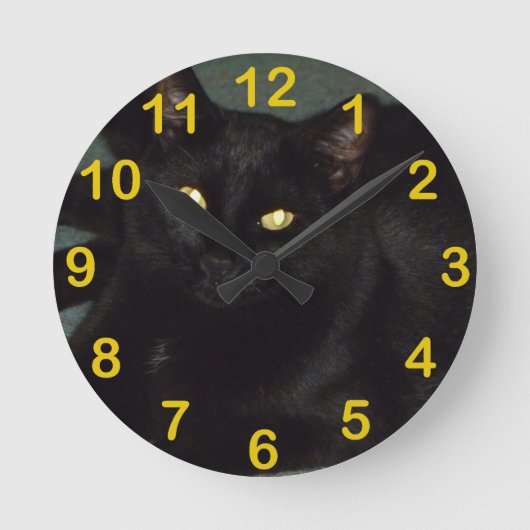 Goldene Augen Runde Wanduhr (Vorderseite)