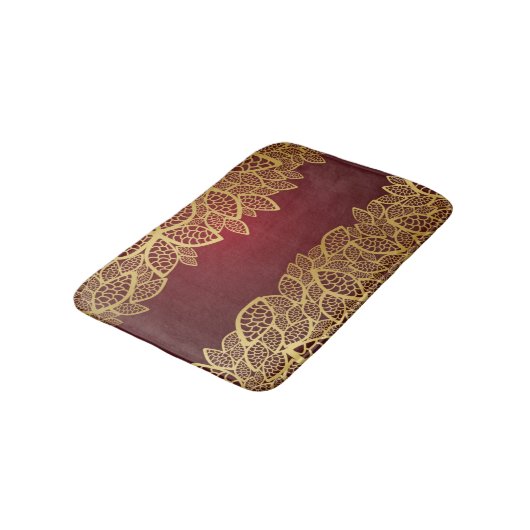 Goldene Blatspitze auf rotem Hintergrund Badematte (Schrägansicht)