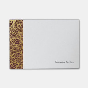 Goldene Blatspitze auf rotem Hintergrund Post-it Klebezettel