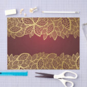 Goldene Blatspitze auf rotem Hintergrund Seidenpapier (Handwerk)