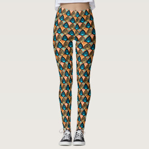 Goldene Blätter aus geometrischen Palmen im Art Dé Leggings