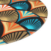 Goldene Blätter aus geometrischen Palmen im Art Dé Schneidebrett (Ecke)