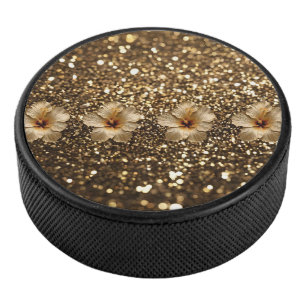 Goldene Eleganz: Goldener Hibiskus-Shimmer Eishockey Puck