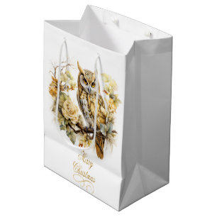 Goldene Eule auf einem Weihnachtszweig Mittlere Geschenktüte