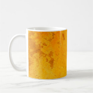 Goldene Farbe der Zement-Textur Hintergrundabstrak Kaffeetasse