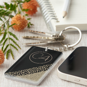 Goldene Federn auf Schwarz-Glitterie-Monogramm Schlüsselanhänger